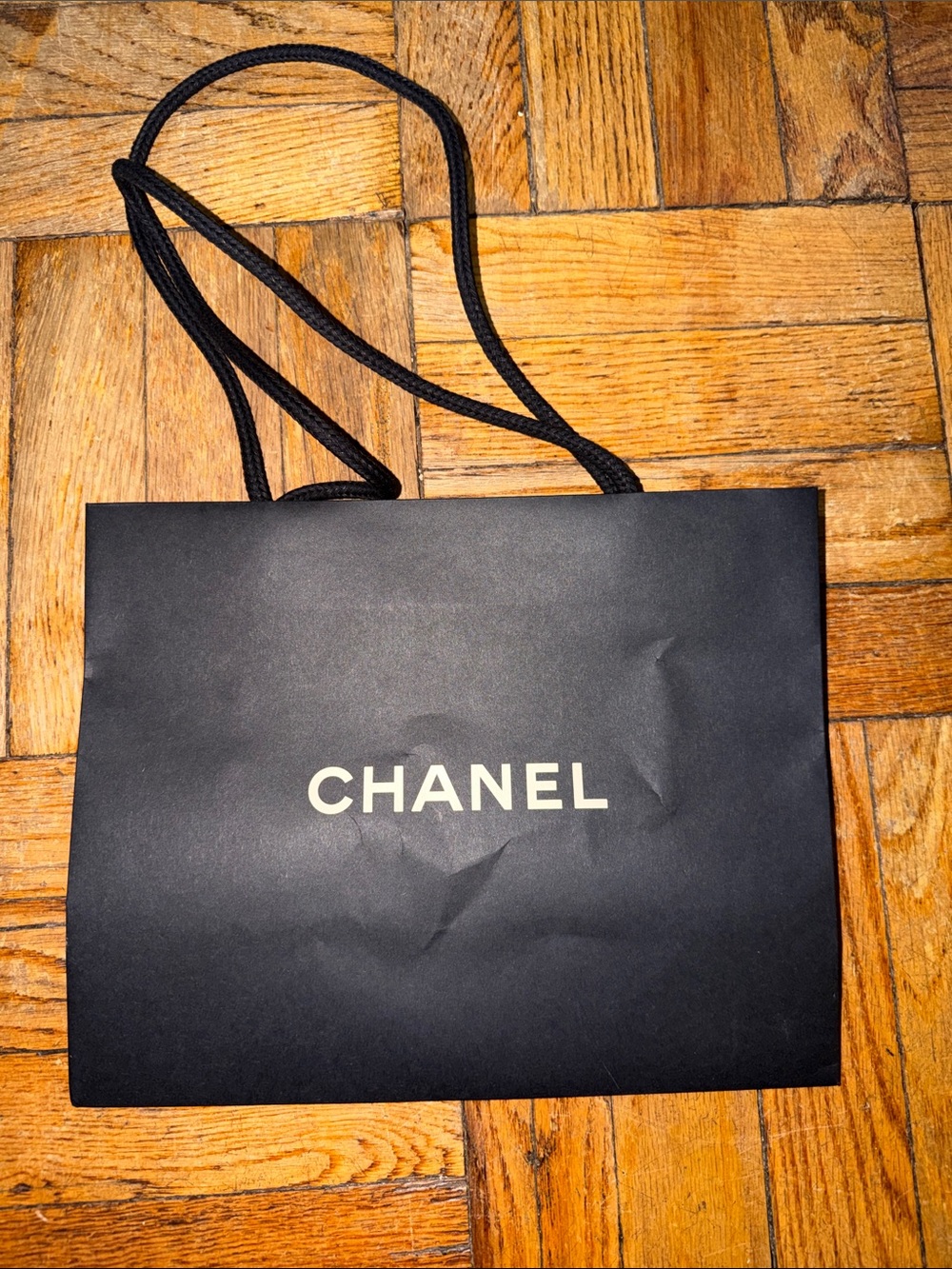 CHANEL Black Paper Shopping Bag with White Logo